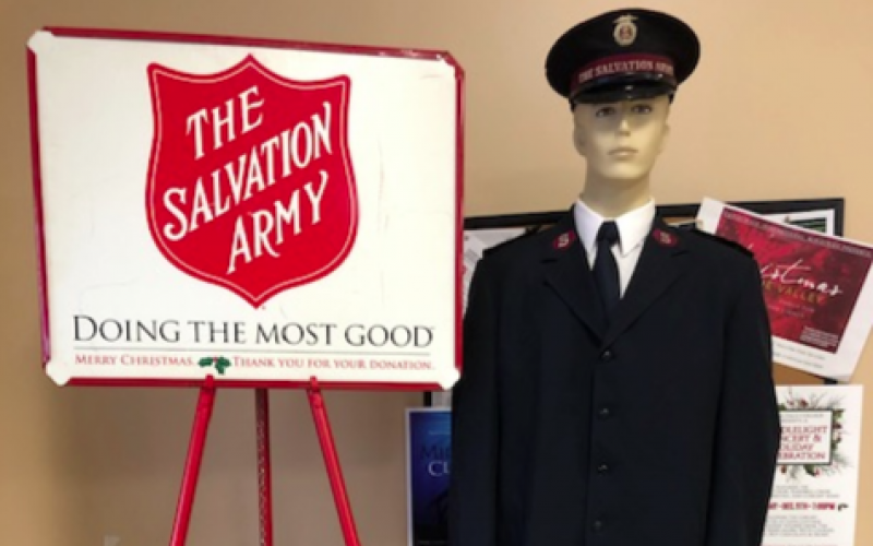 Iconic Salvation Army red kettles will be accompanied by human bell-ringers. This season apps to make a donation at the kettle also are offered.