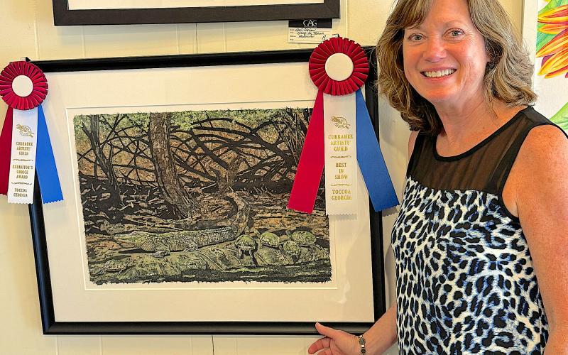 Gail Watson shows off her work entered in the Currahee Artist’s Guild  fall show. She won Exhibitor’s Choice and Best in Show.