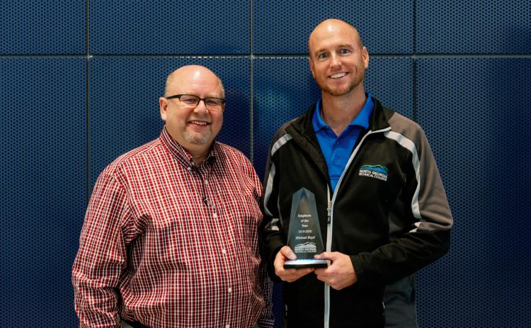 NGTC president Dr. Mark Ivester (left) and employee of the year Michael Boyd (right).