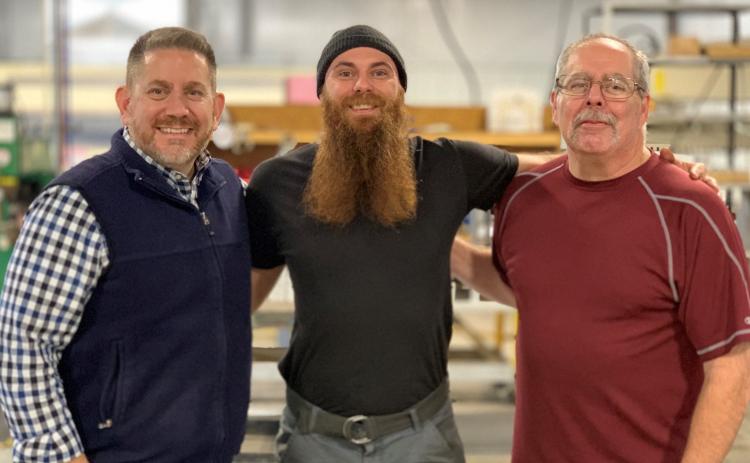 Pictured are (from left) Jon Heffer, PTL president and CEO;  Jamie Whitfield, sheet metal technician and 2019 Employee of the Year; and John Buchanan, PTL production manager and the 2018 PTL Employee of the Year.