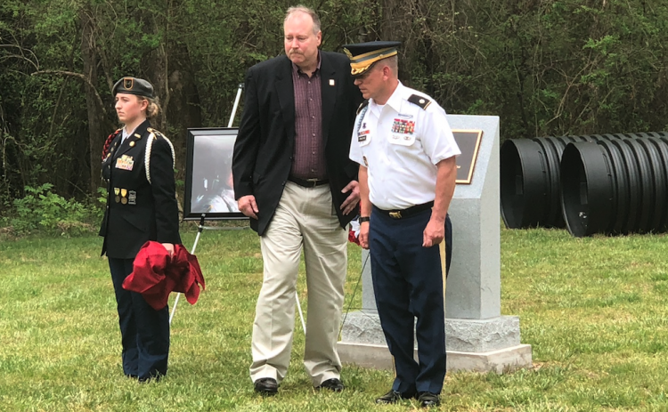 The Crone Foundation, formed in honor of Air Force veteran Robert F. Crone Jr., donated $25,000 for a new JROTC obstacle course at Stephens County High School. Pictured in front of a monument at the course are (from left)  JROTC battalion commander Shay Fischer, Bob Crone (John Crone's brother), and JROTIC senior instructor LTC (Ret) David Priatko.