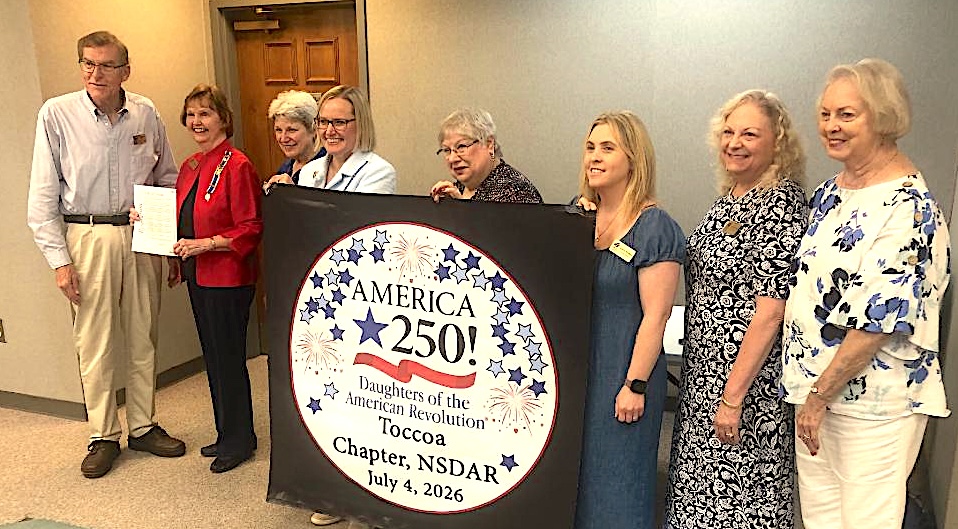 The Toccoa City Commission on Monday approved a proclamation recognizing the work of the local chapter of the Daughters of American Revolution (DAR) in promoting the upcoming 250th birthday of the United States of America. Toccoa Mayor Evan Hellenga, on the left end, presented the proclamation to DAR members in attendance at Monday’s meeting.