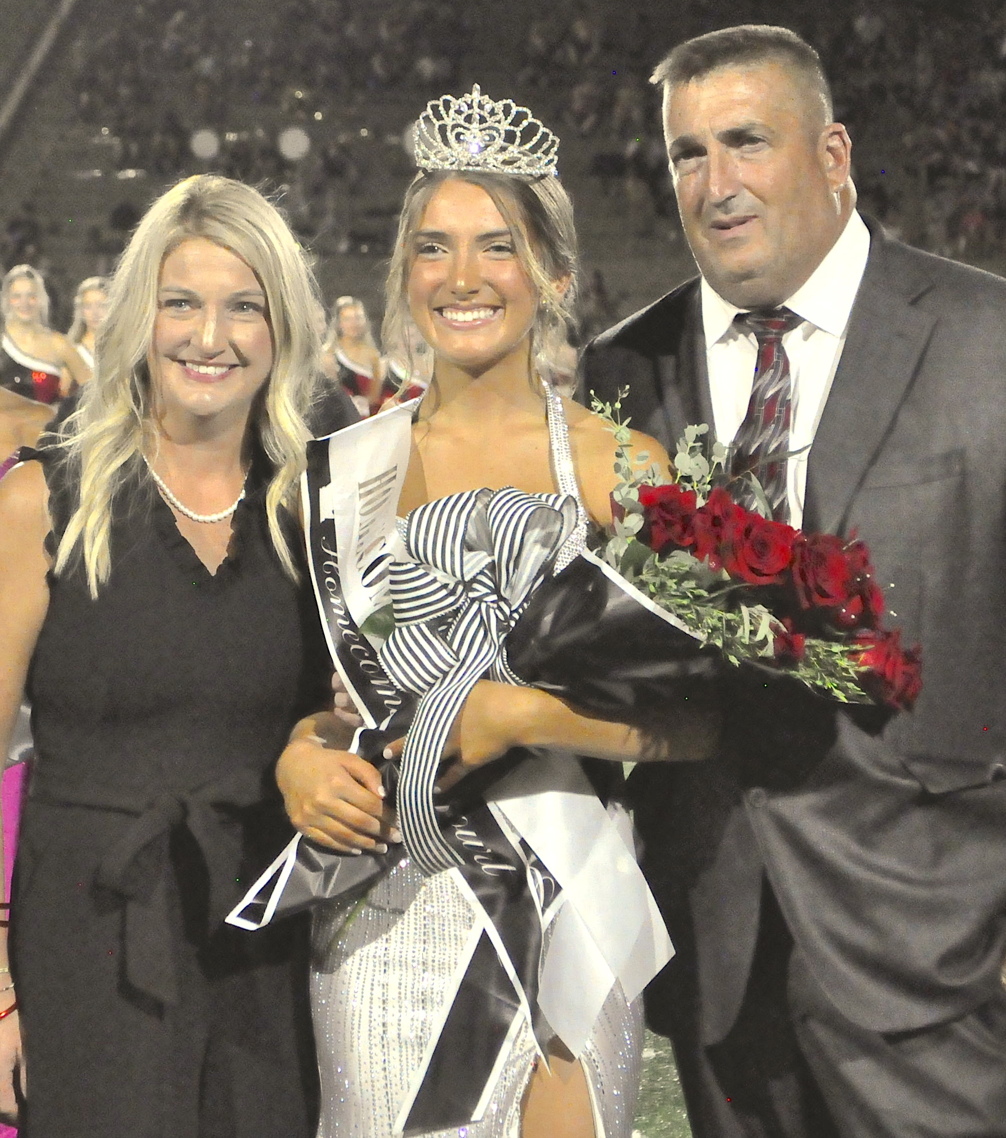 Macie Davis with her parents, Amy and Jamie.