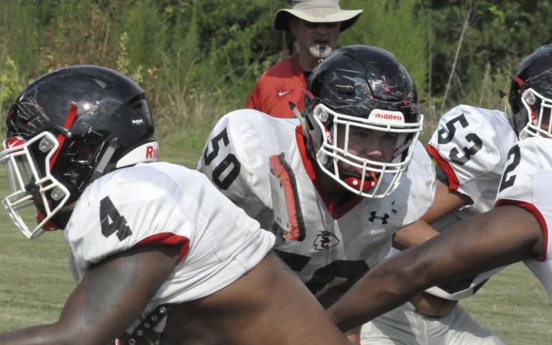 Lineman William Rudeseal (50) mixes it up during a recent practice session drill. Rudeseal and his teammates will have a pre-season scrimmage with White County this evening.