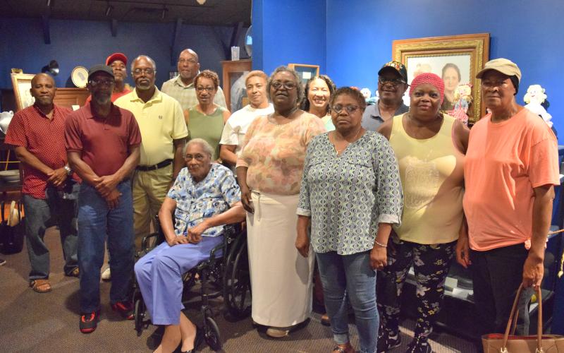 Pictured are former students and a teacher of Oak Hill Elementary School. They are Hayward Cochran Jr, Thomas Richie, Charlene Hayes Echols, Frances Smith, Shirley Combs, Peggy Combs, Jerry Haymond, Walter Richie, Calvin Combs, Doris Prather, Rachel Burton, Shirley Lippitt, Roy Richie and Jeraldine Hayes.