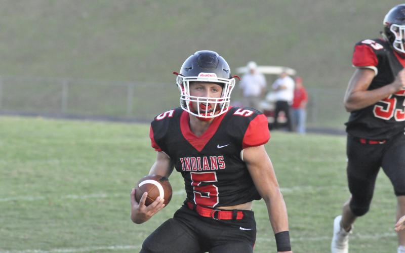 Hudson Spurlcok runs up field against White County. Photo by: Marcus Etienne