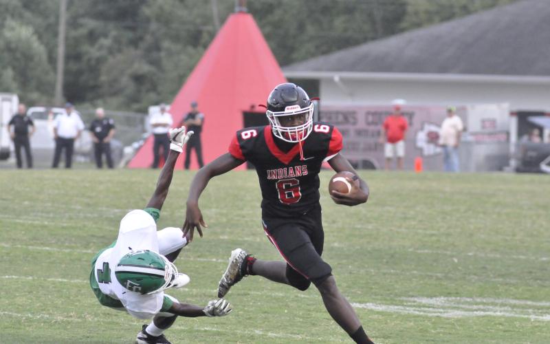 Gamarion Carter leaves Franklin County player in his dust. Photo by: Marcus Etienne