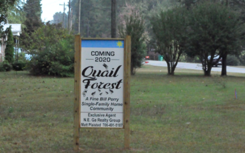 A sign near the intersection of Roselane and Skyline Drive heralds Bill Perry’s new development.