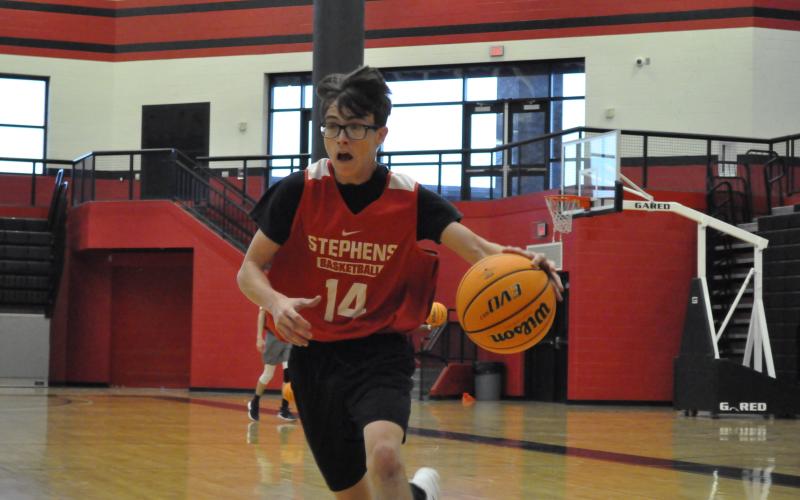 River Duncan drives during practice