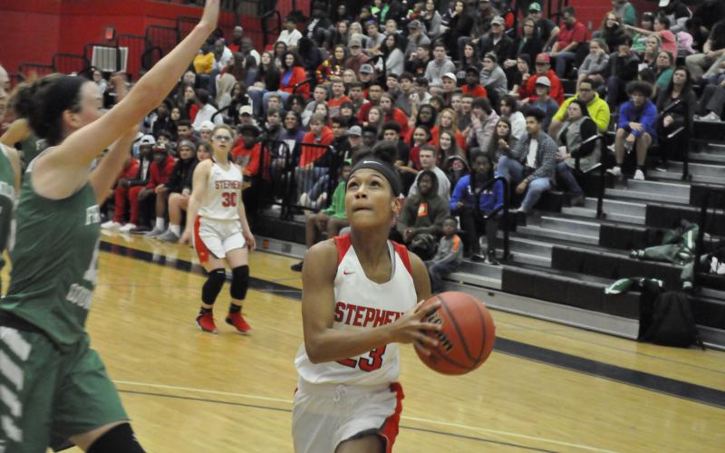Kiki Howard goes up for a layup against a Franklin County player