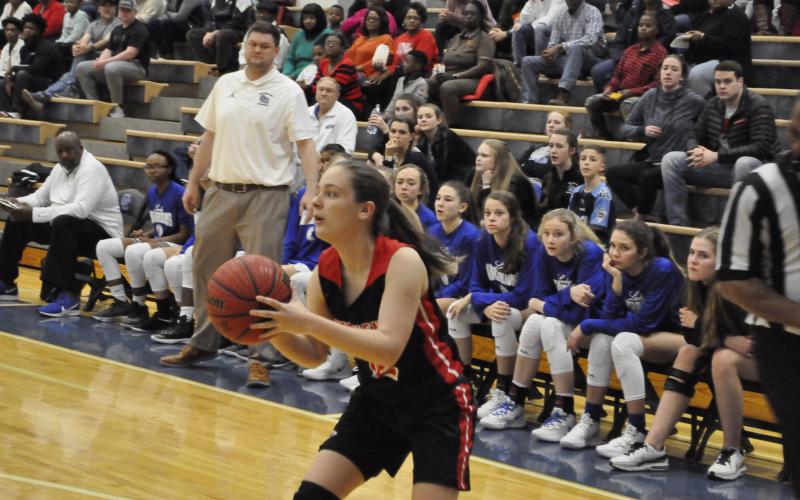 Lindsay Moore shoots a three