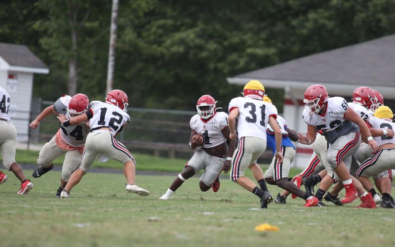 Indian running back Zach Feaster (1) looks for running room during a recent Stephens scrimmage.