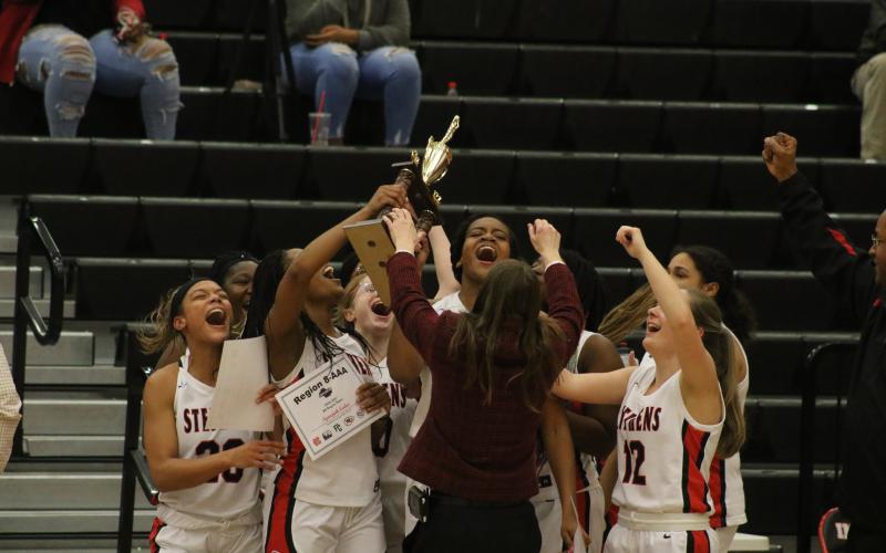 Lady Indians celebrate