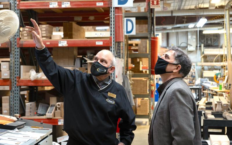 Osborne Wood Products Inc. CEO Leon Osborne (left) takes U.S. Rep. Andrew Clyde on a tour of the Osborne manufacturing facility.