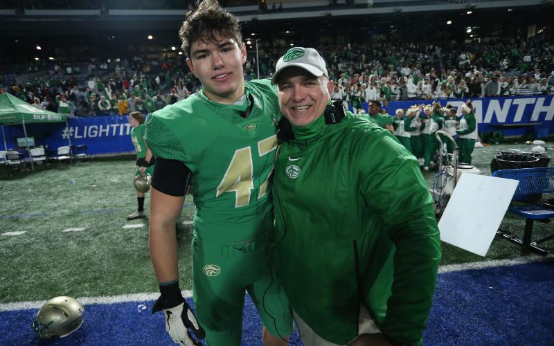 Bryan Rogers (right) and son Brett