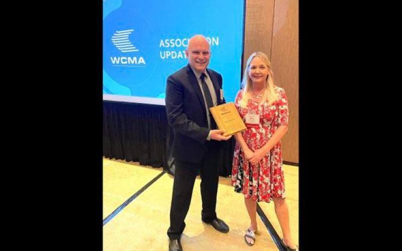 Osborne Wood CEO Leon Osborne (left) was recognized at the WCMA Fall Conference.