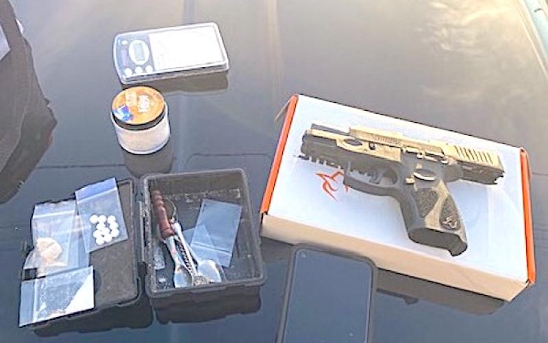 These are some of the drugs and a weapon seized by law enforcement officers following an arrest made on Oct. 22.
