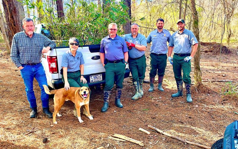 Corps of Engineers river cane work crew members were (from left) Jeff Brooks, Sandy Campbell, Jason Whiting, Tim Crabtree, Dustin Cullen and Buddy the dog.