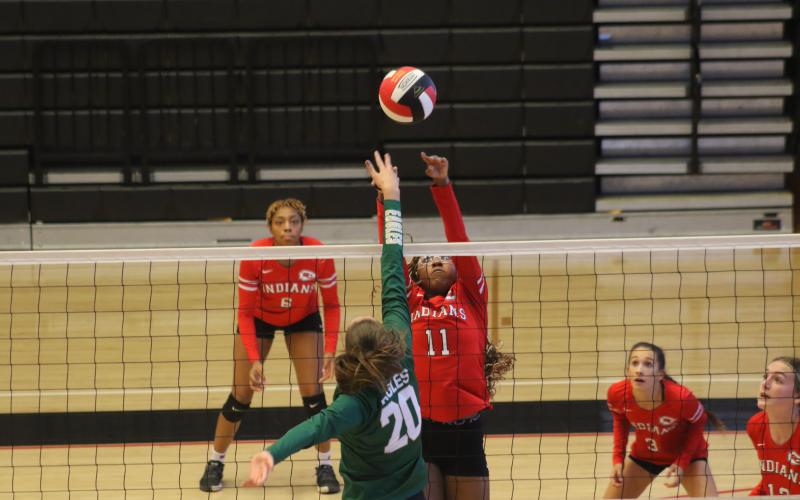 A'niya Mayweather going up for a block