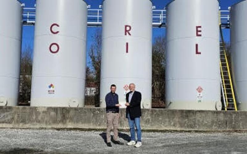 Making the presentation to Project Chairman Gary Bellamy Is Acree Oil Company representative Brent Bellamy.