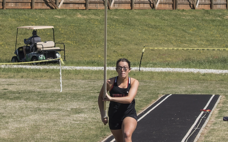 Stephens County High School's Kinsley Thomason takes aim for a pole vault.