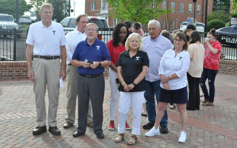 Pictured, left to right,are city commissioners Evan Hellenga, Terry Carter, Ron Matheson, city manager Fredda Wheeler, mayor Gail Fry, Rev. Paul Garrison and commissioner Michelle Jamieson.