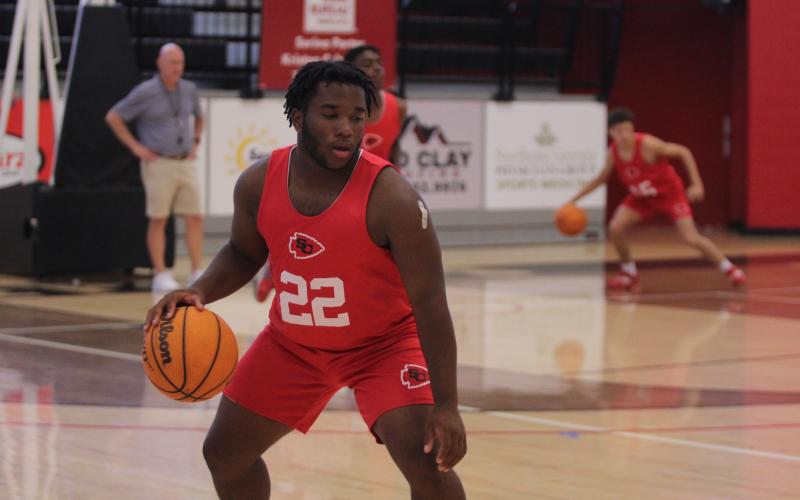 Rising junior Zykemian Durham maintains control of the ball.