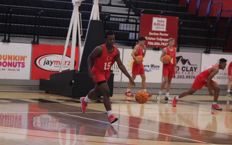Rising sophomore Carmelo Renfroe sprints down the court.