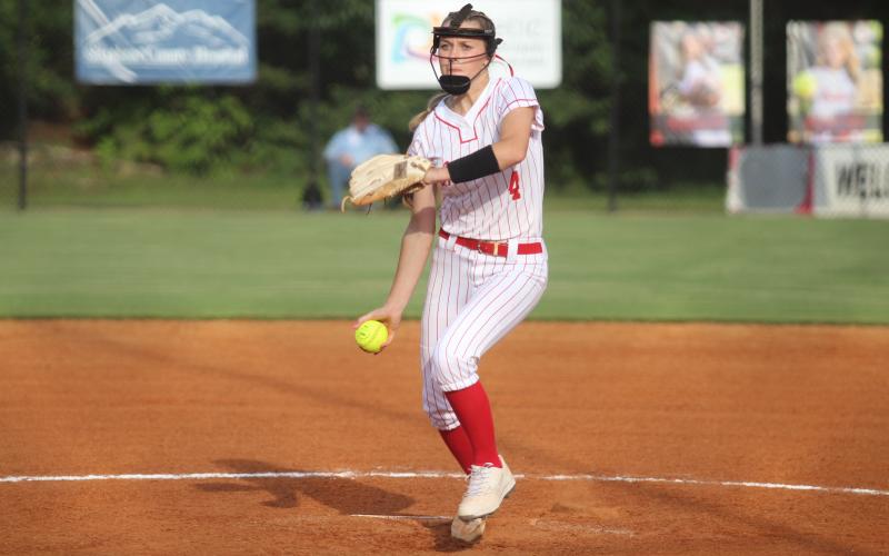 Senior Riley Walker winding up for the pitch at the home opener against Elbert.