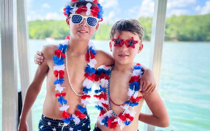Kim Caudell is the winner of the 2025 summer Lake Living cover contest. The cover features her two sons, Britt and Benjamin.