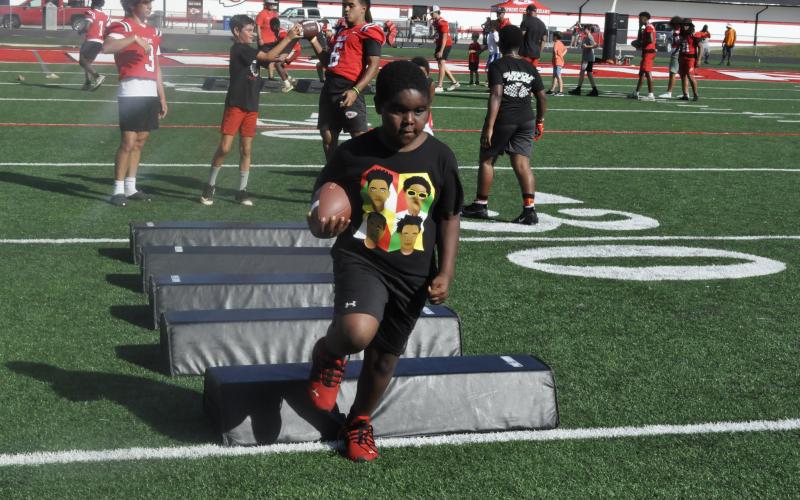 The Stephens County High School football team held its Future Indians camp on Monday night, which teaches first through fifth grade students the fundamentals of playing football. Assistant coach David Poffenberger told The Record the event had 25 students participate and said the event is a great way to do community outreach. The camp also gave the students the opportunity to meet the high school football players and run drills alongside them. Photo by Michael O'Hearn