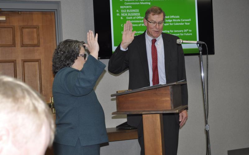 City commissioner Evan Hellenga was sworn in for another term and unanimously named the city's mayor for 2026 during the city commission's meeting on Monday, Dec. 22.