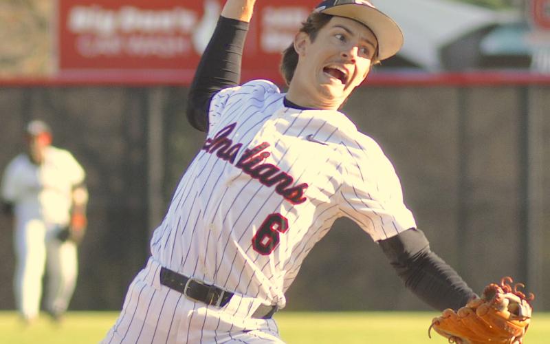 Noah Strickland has a look of determination on his face as he makes a pitch.