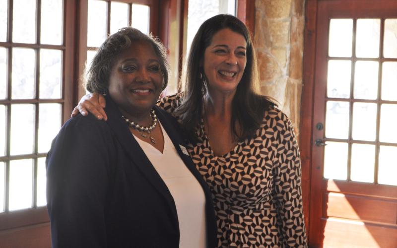 Shantelle Grant, left, is the children's services coordinator with the Toccoa-Stephens County library. Last week, she was honored for receiving Employee of the Year by the Georgia Public Library Service. She's being embraced by Delana Knight, director of the Northeast Georgia Regional Library System.