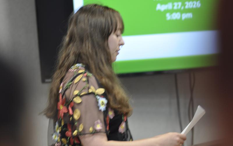 Olivia Adams, owner of Magic Oven in downtown Toccoa, presents a petition to the City of Toccoa asking them to reinstate the Ida Cox summer concert series in full.