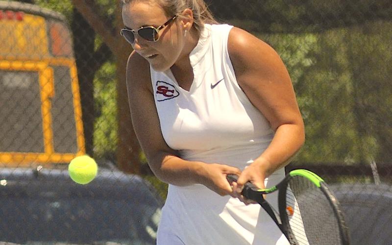 Makayla Rogers gets ready to hit the ball back over the net during the playoffs.