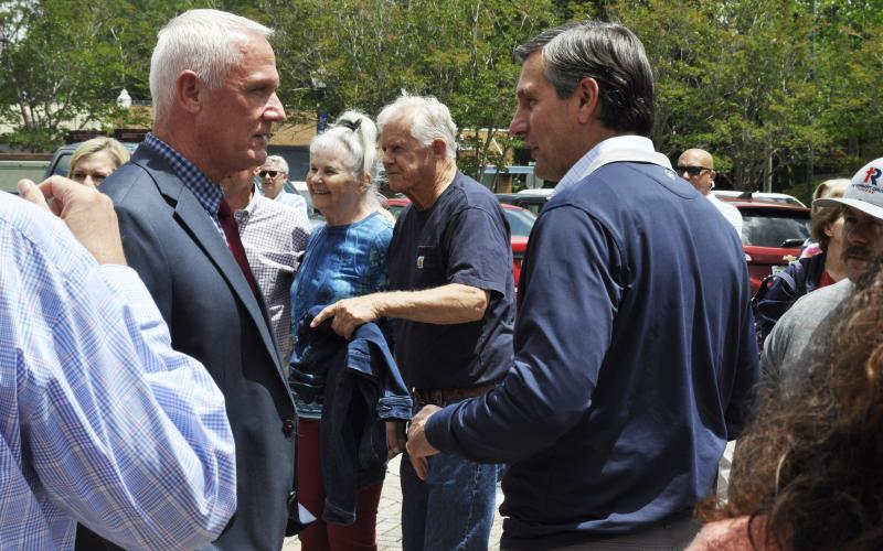 U.S. Senate candidate Derek Dooley has a chat with Stephens County Sheriff Rusty Fulbright.