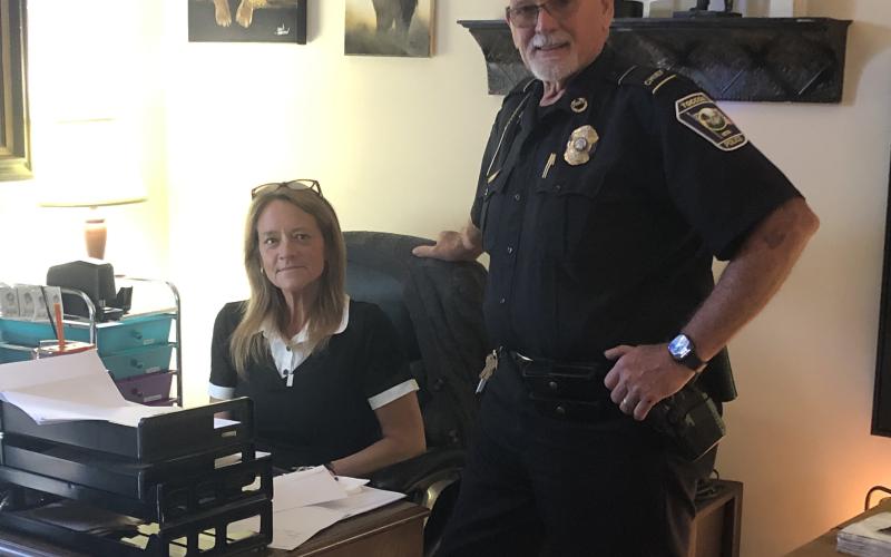 Lynn Walton, left, and Toccoa police chief Bruce Carlisle, right, are spearheading an effort to get the Toccoa Police Department state certified.