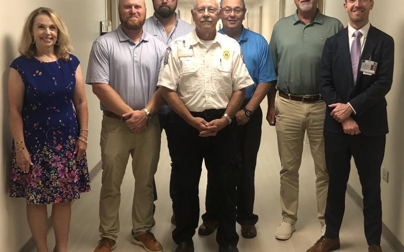 The Stephens County Hospital Authority honored Aaron Wilkinson at its monthly meeting on Thursday, Aug. 20. Pictured from left to right are Phyllis Ayers, Mak McAllister, Bo Dotson, Wilkinson, Clay Fisher, Hospital Authority chair Rick Phillips, and Stephens County Hospital CEO Van Loskoski.