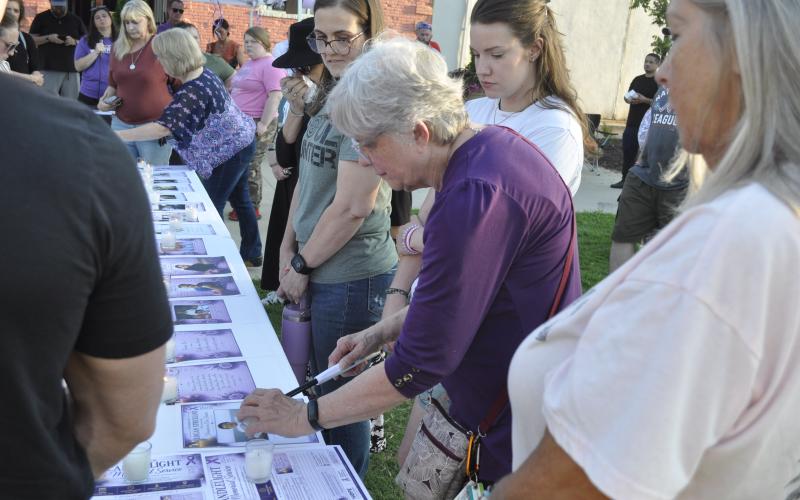 On Sunday, Aug. 30, Hope for a Drug Free Stephens held its fourth annual remembrance event at the Tugalo Greenspace.Among those in attendance was Kathy Petraeus, seen here lighting a candle in memory of her son, Logan.
