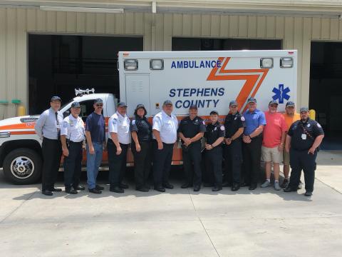 Past and present members of the Stephens County EMS recently gathered to kick off the celebration of the 50th anniversary of the ambulance service. Pictured are (from left) hospital CEO Mike Hester, EMS director Aaron Wilkinson, Andrew Burkhart, Chris Stephens, Donna Kieffer, Bobby Westmoreland, Matt Moore, Jake Murray, Blake Simpson, Stanley Ansley, James Norris, Tony Thomas and Joshua Smith.