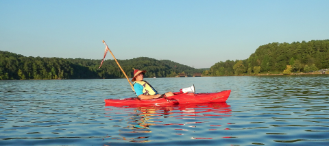 Local historian Kelly Vickers leans back and soaks in the beauty that is the Tugaloo River Sunset Paddle held the Saturday before Labor Day.