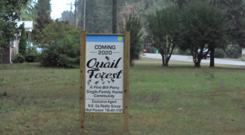  A sign near the intersection of Roselane and Skyline Drive heralds Bill Perry’s new development.