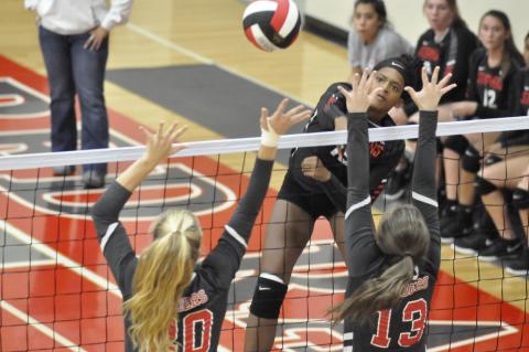Ranajah Verdell sends a spike into Madison County's defense 