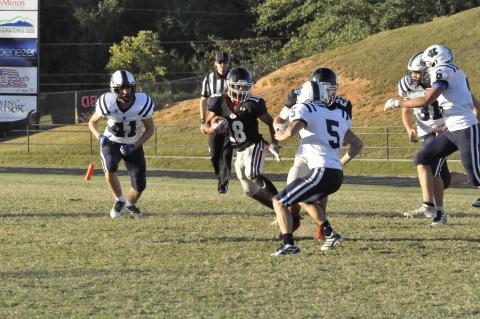 Bryson Trimier runs the ball against White County
