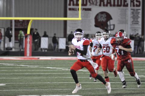 Stephens County quarterback Kenny Colwell sprints for extra yardage in a game from last Friday. SCHS teams will be competing in AAA instead of AAAA next season.