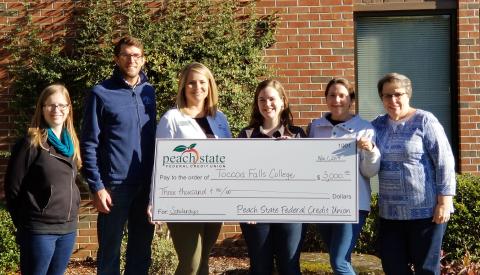 Pictured are Jennifer Doll, administrative assistant at Toccoa Falls College; Joseph Murrey, development officer at Toccoa Falls College; Letha Stowe, business development for Peach State Federal Credit Union; Amy Larson, student at Toccoa Falls College and scholarship recipient; Kristina Lightfoot, assistant professor of Teacher Education; and Dr. Donna Gardner, chair, Teacher Education Department at Toccoa Falls College.