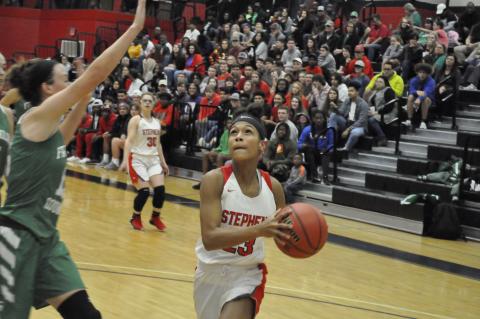 Kiki Howard goes up for a layup against a Franklin County player 