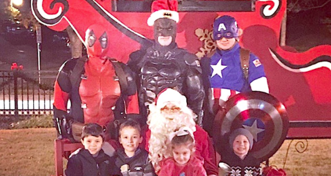 Heroes in Force (standing) met with Santa and some of his new friends at last year’s event.