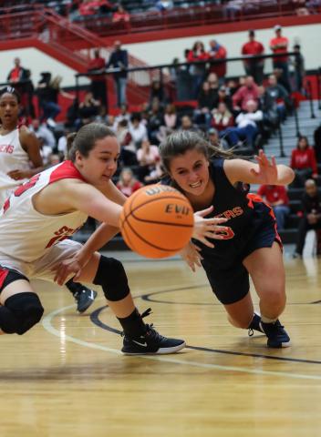 Lindsay Moore fights for a loose ball with a Habersham player. Courtesy of David Byargeon